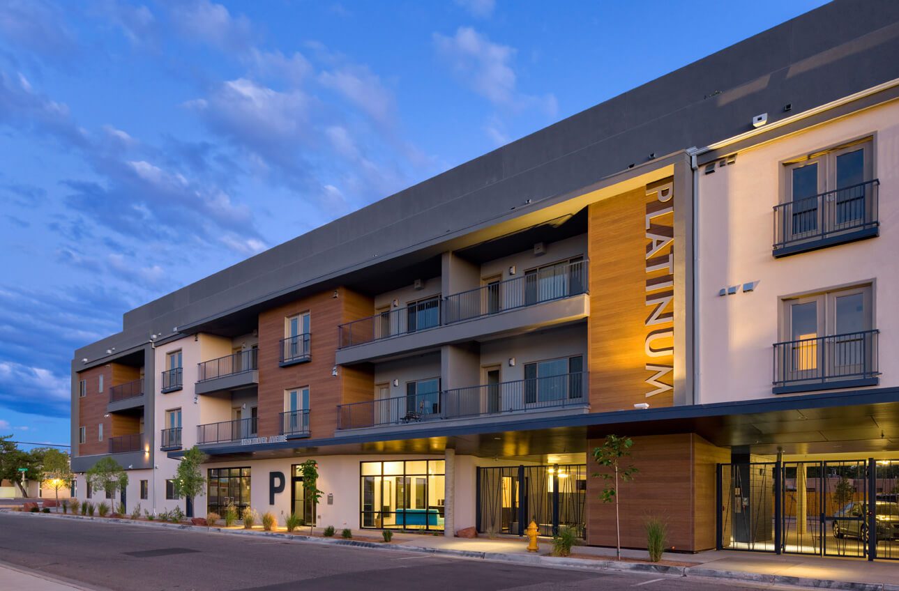 Platinum Apartments exterior at dusk